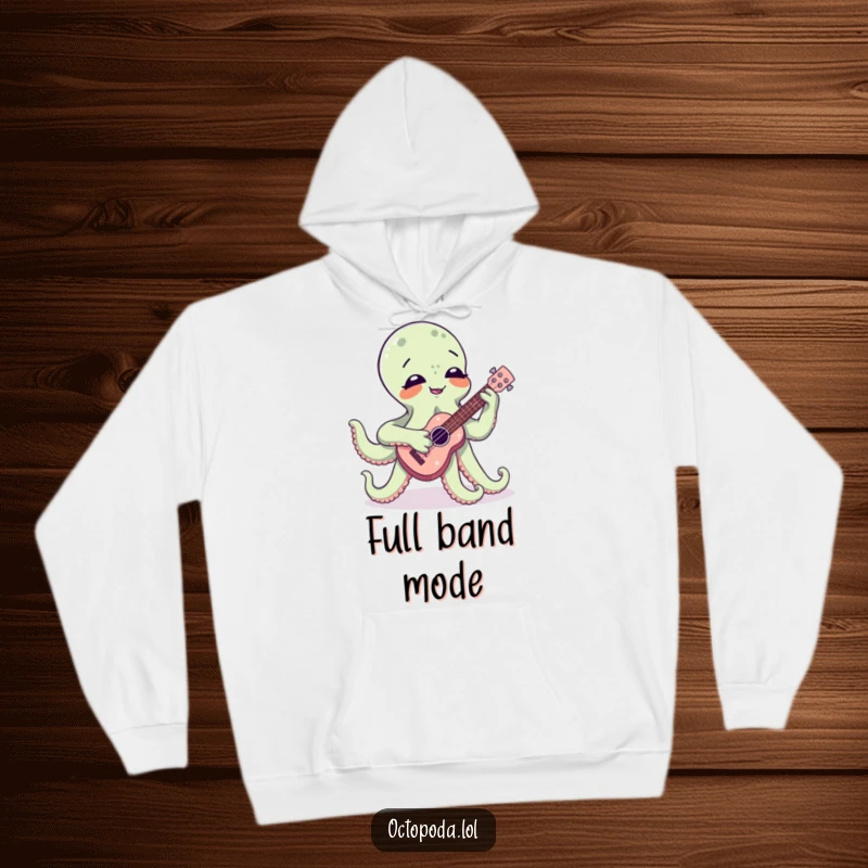 Funny hoodie showing a joyful octopus enthusiastically playing a small ukulele, its many tentacles creating a comical musical scene.