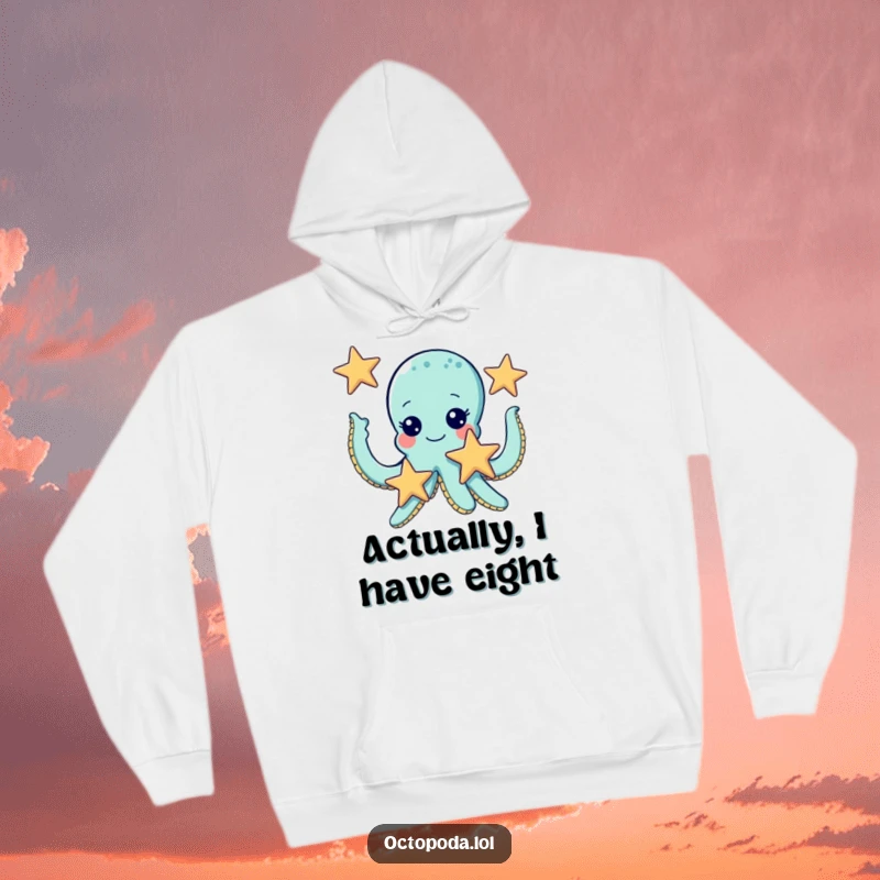 Funny hoodie featuring a cute octopus with wide, giggling eyes, skillfully juggling three starfish in a delightful underwater scene.