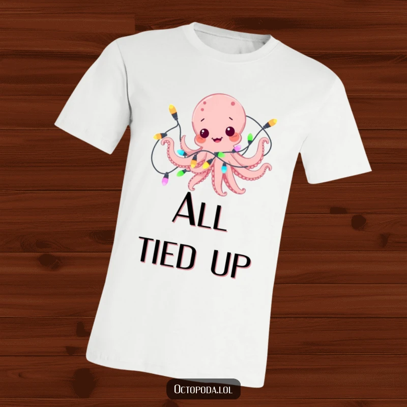 Funny t-shirt featuring a playful octopus comically tangled in a string of vibrant, multi-colored lights, looking endearingly stuck.