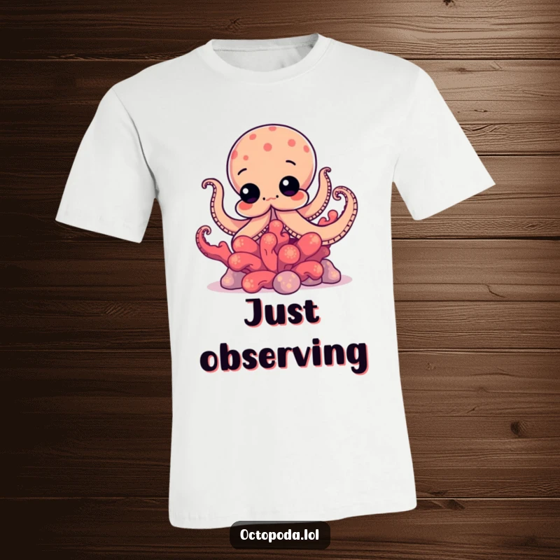 Funny t-shirt featuring a curious octopus peeking out from behind a brightly colored coral, hinting at hidden fun.